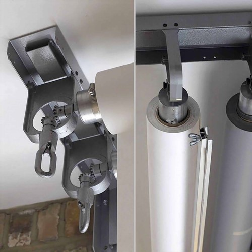 Lås fast rullen mot bommem med kil eller klämma