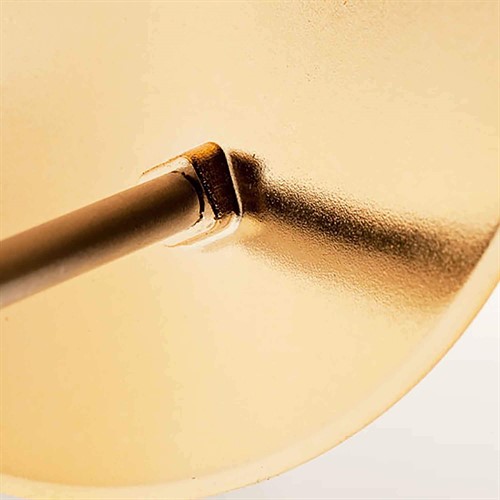 Gulddeflektor ger bilden en varm ton