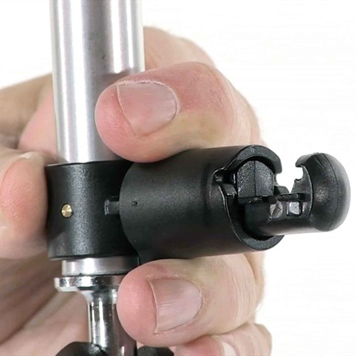 Spring-loaded brackets at top and bottom