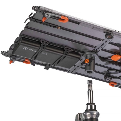Securely fastens within any track